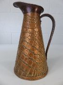 Copper jug with hammered decoration approx. 21cm tall