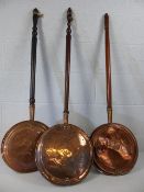 Three copper bed pans