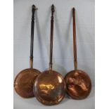 Three copper bed pans