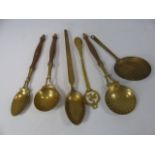 Collection of brass kitchen utensils