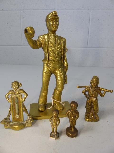 Five brass figurines