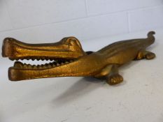 Large brass nutcracker in the form of a crocodile approx 38cm long