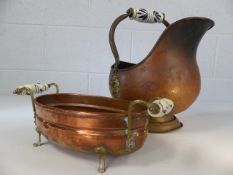 Copper coal scuttle and a copper planter, both with blue and white ceramic handles