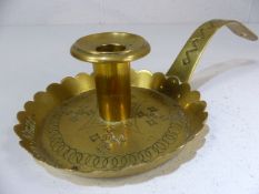 Brass candle carrier inscribed "Goodnight" to the rim