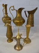 Collection of six brass jugs and vases