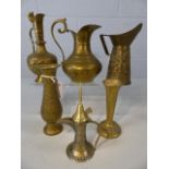 Collection of six brass jugs and vases