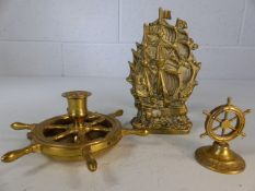 Nautical brass items to include candlestick, ships wheel and galleon