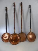 Four copper bad pans