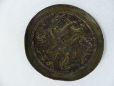 Circular brass raised depiction of a Roman scene. Approx. 18cm in diameter