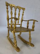 Brass heavy model of a rocking chair. Approx 24cm high and 2.1kg