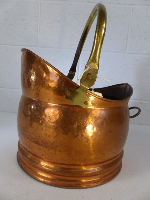 Copper coal scuttle with brass handle