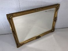 Modern gilt framed bevel edged mirror, approx 104cm x 73cm