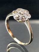 18ct Platinum Diamond Daisy cluster ring. The seven Old Cut Diamonds are set in an approx 9.75mm