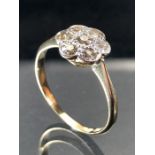 18ct Platinum Diamond Daisy cluster ring. The seven Old Cut Diamonds are set in an approx 9.75mm