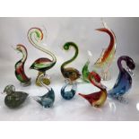 Collection of Murano-style glass over two shelves