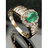 14ct yellow gold emerald and diamond ring