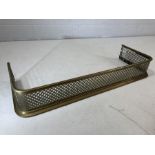 Brass fender with pierced decoration approx 83cm x 30cm