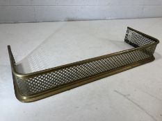 Brass fender with pierced decoration approx 83cm x 30cm