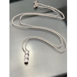 18ct White Gold chain with 18ct white Gold pendant set with Three Bright Diamonds