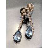 Pair of Aqua Marine and Diamond Drop Earrings. Set in white metal (unmarked) and with an approx: