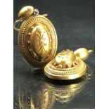 Pair of Victorian Hollow Yellow metal Etruscan Revival Earrings. (One) Domed Oval drop approx: 23.