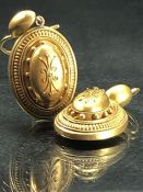 Pair of Victorian Hollow Yellow metal Etruscan Revival Earrings. (One) Domed Oval drop approx: 23.