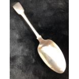A George III silver fiddle pattern serving spoon, by Sarah Purver, hallmarked London 1817,
