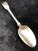 A George III silver fiddle pattern serving spoon, by Sarah Purver, hallmarked London 1817,