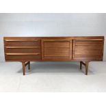 Mid Century sideboard by Elliotts of Newbury with two cupboards and three drawers. Approx length