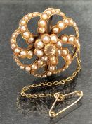 18ct Yellow Gold ‘Catherine Wheel’ style Brooch measuring approx: 30.25mm in diameter. There are 8