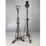 Pair of standard oil lamp stands, one with lamp