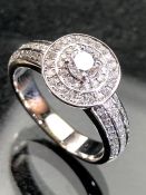 9ct white gold diamond cluster ring of approx 0.65cts