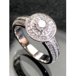 9ct white gold diamond cluster ring of approx 0.65cts