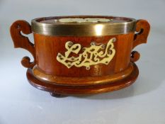 WWI Cherry wood oval money box with bone detailing marked 1917