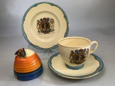 Clarice Cliff beehive honey pot (A/F) along with a Clarice Cliff Elizabeth II Coronation three piece