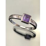9ct White Gold Ring with a 5.2mm (including setting) square set Amyethyst and two Diamonds to each
