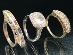 Three Silver rings of differing modern styles