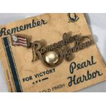 Militaria: WWII "Remember Pearl Harbor" pin on original card "24k GOLD FINISH" with American Flag.