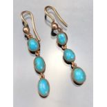 Pair Yellow Gold (Unmarked) drop earrings approx: 30.5mm drop of 3 oval Turquoise stones from