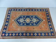 Blue and coral patterned ground rug approx. 182cm x 260cm