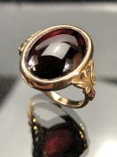 9ct Yellow Gold Ring set with approx 17.1mm x 11.75 Cabochon Garnet. Size approx N UK & 7 USA