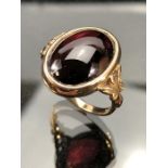 9ct Yellow Gold Ring set with approx 17.1mm x 11.75 Cabochon Garnet. Size approx N UK & 7 USA