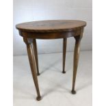 Circular occasional table with bookmatched veneer on Queen Anne legs. Diameter approx 60cm