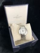 Maurice Lacroix stainless steel watch model ad68/12 with white face and date aperture at 6 o'clock