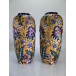 Pair of Czechoslovakian vases by Amphora, marked to base. Approx height 25cm