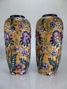 Pair of Czechoslovakian vases by Amphora, marked to base. Approx height 25cm