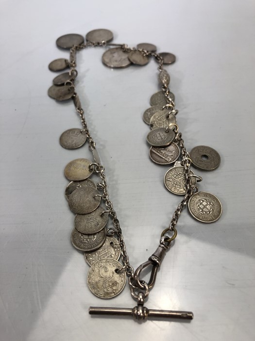 Hallmarked silver chain and Albert with a collection of various silver coloured coins total weight - Image 3 of 4