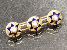 High carat gold Brooch set with three studs decorated with Diamonds Pearls and blue enamel stars (