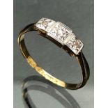 18ct yellow Gold ring with three diamonds set in platinum star shaped mounts (size K UK)