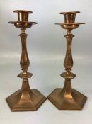 Pair of heavy Copper candlesticks on hexagonal bases approx 27cm tall